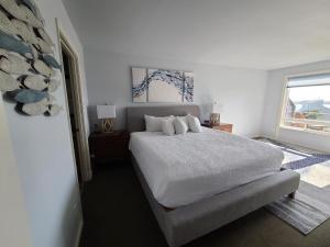 Postel nebo postele na pokoji v ubytování Embarcadero Resort
