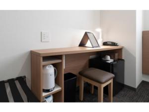 a desk with a laptop and a chair in a room at R&B Hotel Nagoya Ekimae - Vacation STAY 15181v in Nagoya