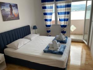 Postel nebo postele na pokoji v ubytování Apartman Dragana