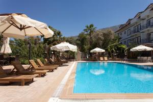 The swimming pool at or close to Green Peace Hotel