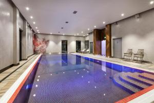 Bazén v ubytování Hotel Sadova nebo v jeho okolí