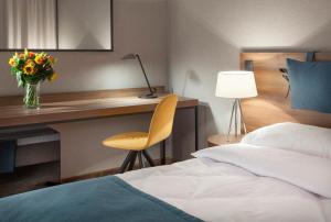 Postel nebo postele na pokoji v ubytování Hotel Sadova