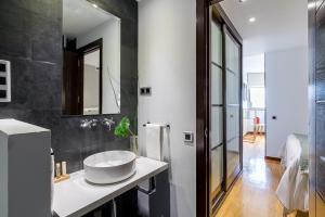 Koupelna v ubytování Madrid Rental Flats - Alquiler de Temporada + 37 fotografií
