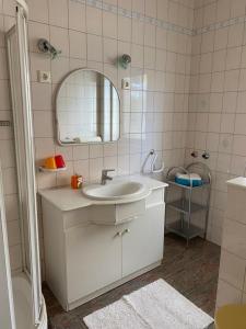 Kúpeľňa v ubytovaní Arany Apartman + 15 fotografií