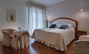 A bed or beds in a room at Terme Europa