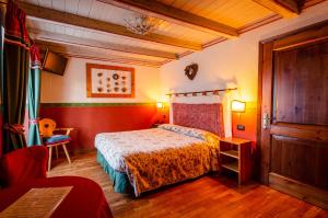 מיטה או מיטות בחדר ב-Hotel Della Nouva