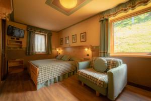 Postel nebo postele na pokoji v ubytování Hotel Della Nouva
