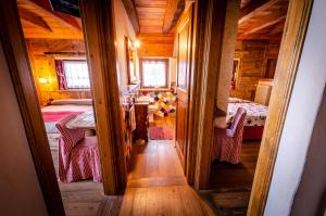 Postel nebo postele na pokoji v ubytování Hotel Della Nouva