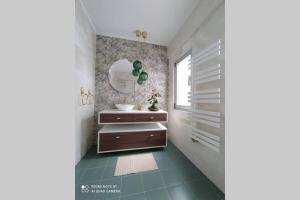 A bed or beds in a room at Lalosa suites