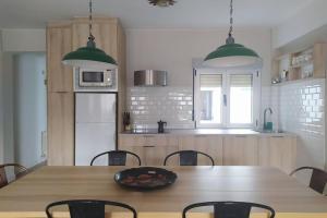 A kitchen or kitchenette at Lalosa suites