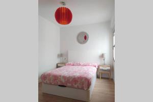A bed or beds in a room at Lalosa suites