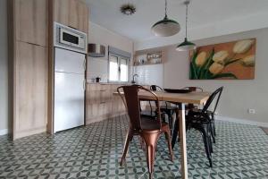 A kitchen or kitchenette at Lalosa suites
