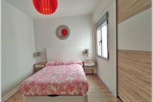 A bed or beds in a room at Lalosa suites