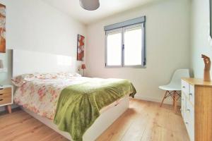 A bed or beds in a room at Lalosa suites