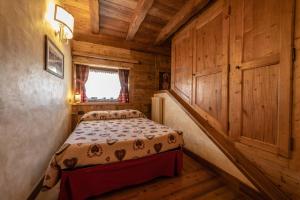 Postel nebo postele na pokoji v ubytování Hotel Della Nouva