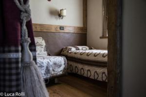 Postel nebo postele na pokoji v ubytování Hotel Della Nouva