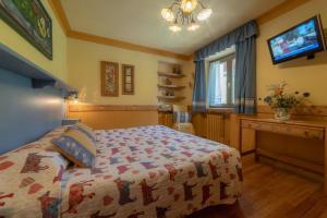 Postel nebo postele na pokoji v ubytování Hotel Della Nouva