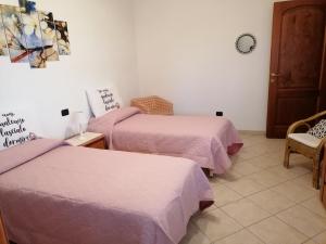 Posteľ alebo postele v izbe v ubytovaní Sa Domo Tua IUN E5942