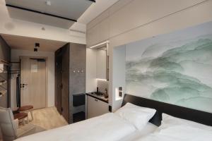 Krevet ili kreveti u jedinici u okviru objekta VALO Hotel & Work Helsinki