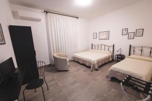 Postel nebo postele na pokoji v ubytování LOCANDA Roma sleep & food