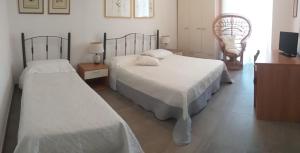 Postel nebo postele na pokoji v ubytování LOCANDA Roma sleep & food