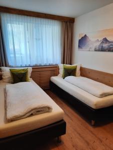Postel nebo postele na pokoji v ubytování Inn-Apartments