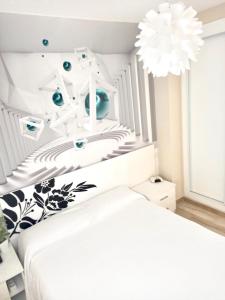 Un pat sau paturi într-o cameră la Atico Opalo