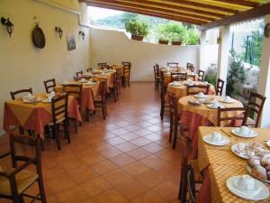 Restaurace v ubytování Hotel Villaggio Tabù