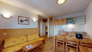 Posezení v ubytování La Grive FAMILLE & MONTAGNE appartements 6pers montagne by Alpvision Residence