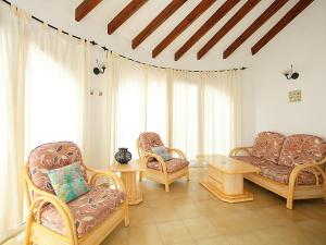 A seating area at VILLA ALCAZAR