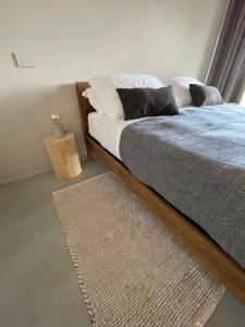 מיטה או מיטות בחדר ב-Il GrecAle - Ristorante e camere