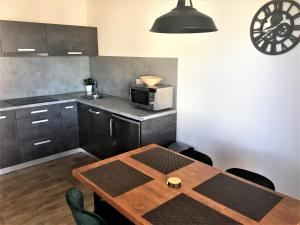 Kuchyňa alebo kuchynka v ubytovaní Horské apartmány Na Pastvinách