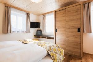 Ένα ή περισσότερα κρεβάτια σε δωμάτιο στο S'Kathrina - Appartements