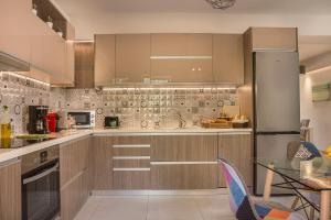 Kuchyňa alebo kuchynka v ubytovaní Grand View Maisonette
