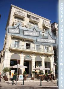 a building with a sign on the front of it at Corfu Unreal View Flats in Corfu Town