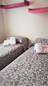 Postel nebo postele na pokoji v ubytování Elio&Mina - appartamento con vista mare