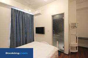 Katil atau katil-katil dalam bilik di Moly Homestay