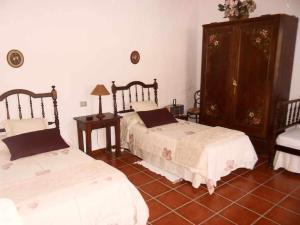 Posteľ alebo postele v izbe v ubytovaní Casa Rural Las Cáscaras Tejeda Gran Canaria + 22 fotografií