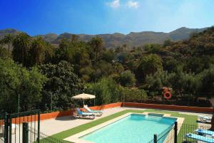 Vista de la piscina de Casa Rural La Fuente de la Flora o alrededores