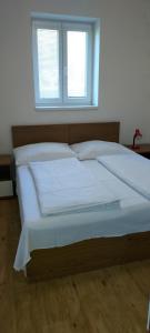 Posteľ alebo postele v izbe v ubytovaní Aparthotel Rezidence Club Canada Lipno