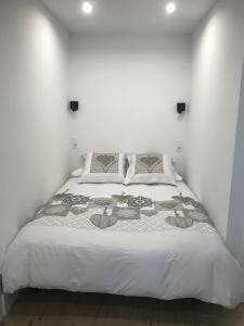 מיטה או מיטות בחדר ב-Estudio reformado con parking en Vall d'Incles, Grandvalira