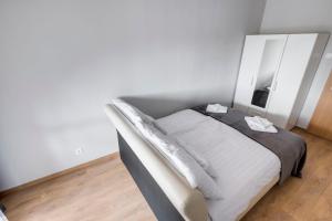 Voodi või voodid majutusasutuse Fonyód Beach Apartment toas