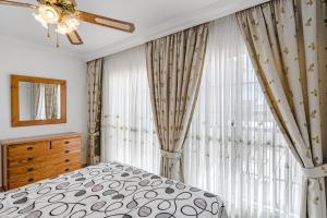 Posteľ alebo postele v izbe v ubytovaní Terrazas del Duque II apartment