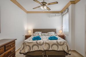Posteľ alebo postele v izbe v ubytovaní Terrazas del Duque II apartment