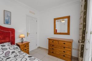 Posteľ alebo postele v izbe v ubytovaní Terrazas del Duque II apartment