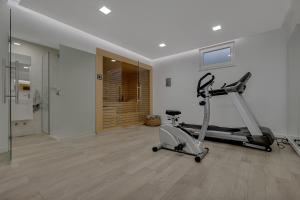 Posilňovňa alebo fitness centrum v ubytovaní Villa Prestige