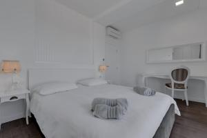 Posteľ alebo postele v izbe v ubytovaní Villa Prestige
