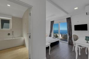 Posteľ alebo postele v izbe v ubytovaní Villa Prestige
