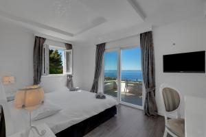 Posteľ alebo postele v izbe v ubytovaní Villa Prestige