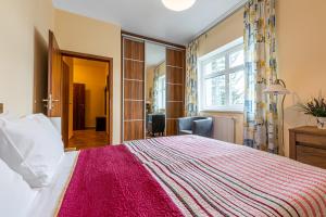 Posteľ alebo postele v izbe v ubytovaní Villa Walir - Spa Hotel Garni SUPERIOR